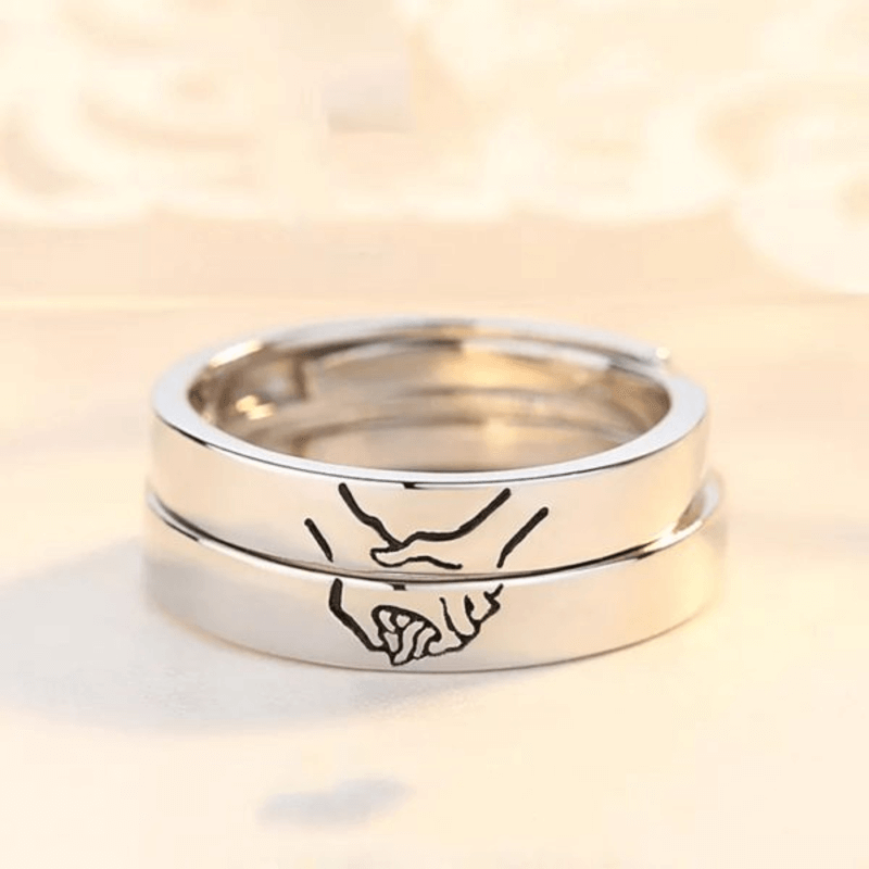 holding-hands-couple-ring-set